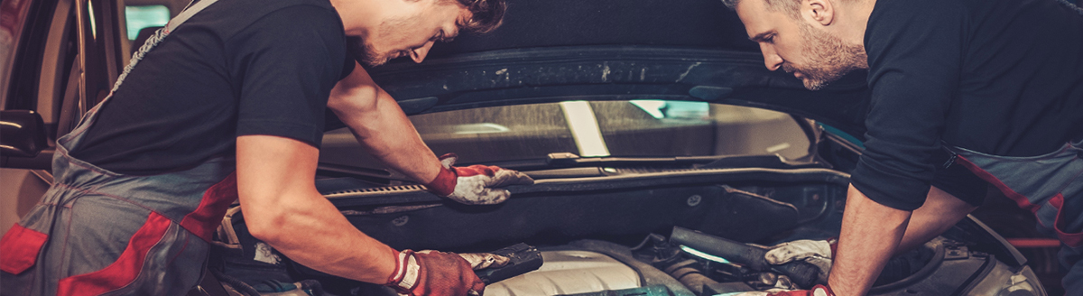 Technicians servicing a vehicle - Servicing Selly Oak